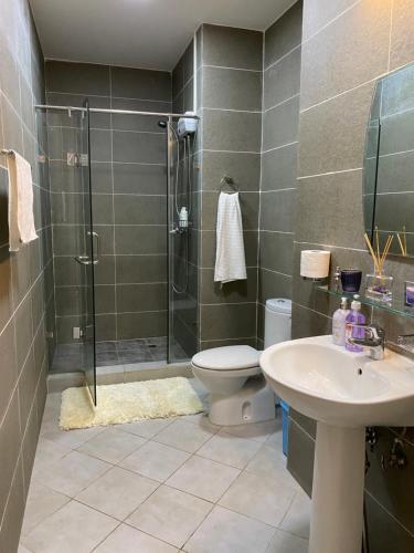 a bathroom with a shower and a toilet and a sink at Gobi-Girl in Ulaanbaatar