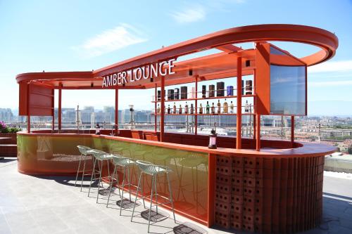 a bar on the roof of a building at Pan Pacific Beijing in Beijing