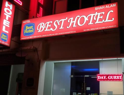 a red best house sign on the side of a store at Best Hotel Shah Alam @ UITM, i-City & Hospital in Shah Alam