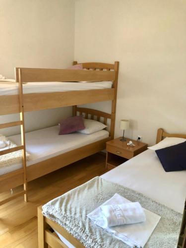 Кровать или кровати в номере Hotel B&B CHAMBERLAIN