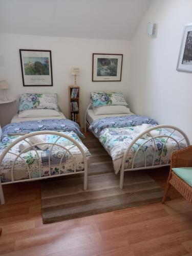 Кровать или кровати в номере Chambres d' Hotes a Benaize
