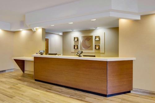 a lobby with a reception desk in a hospital at Comfort Inn Airport in Roanoke
