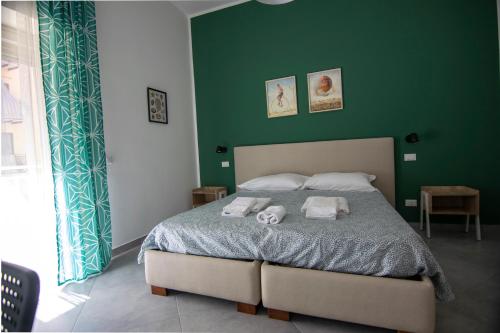Letto o letti in una camera di Civico Undici Holiday Home