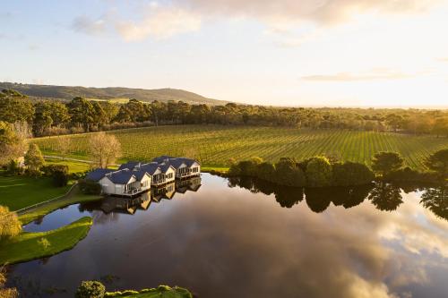 an aerial view of a house on a river at Crittenden Lakeside Villas in Dromana