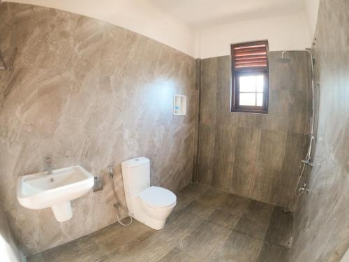Koupelna v ubytování Hotel Anaulundawa