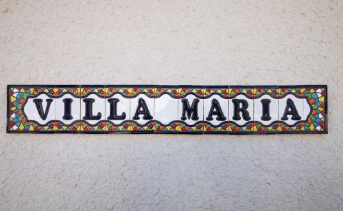 a sign that says villa marilla on a wall at GREAT VILLA MARIA in Paralimni