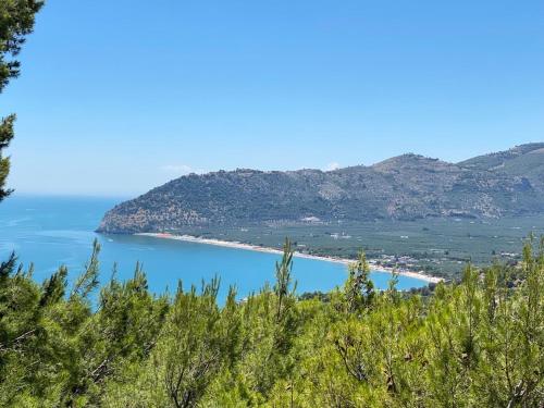 a view of a beach from a hill at Villa Marhù in Mattinata