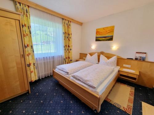 Кровать или кровати в номере Das Landhaus