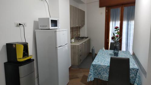 Köök või kööginurk majutusasutuses Sogno d'estate