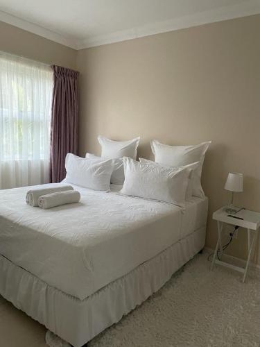 Cama ou camas em um quarto em Everly4 Guest Apartment