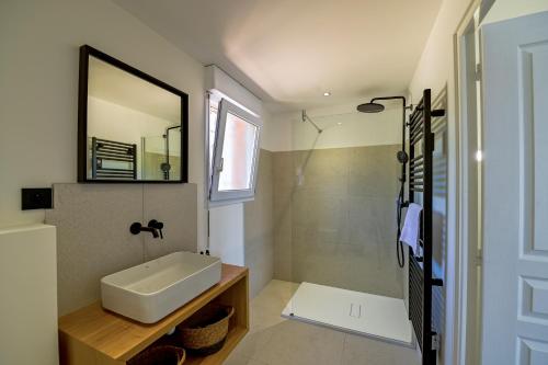 Et badeværelse på Cala di Sogno - Résidence de Charme