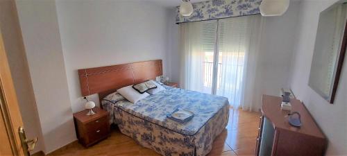 Ein Bett oder Betten in einem Zimmer der Unterkunft Apartamento en Ogíjares, a 3 kilómetros de Granada