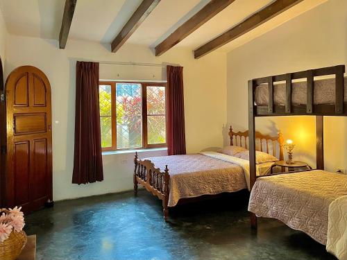 Ένα ή περισσότερα κρεβάτια σε δωμάτιο στο Casa de campo privada cerca a Chan Chan
