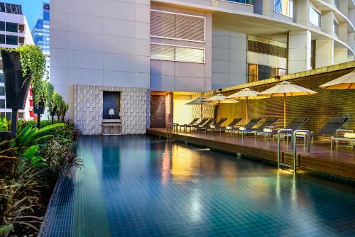 The swimming pool at or near Pullman Bangkok Grande Sukhumvit - SHA Certified