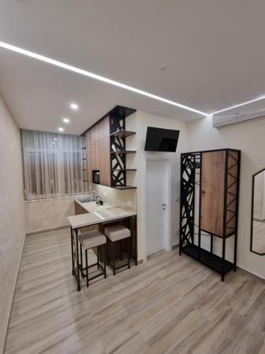 TV a/nebo společenská místnost v ubytování Up Apartments