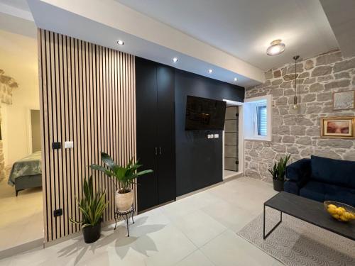 Μια τηλεόραση ή/και κέντρο ψυχαγωγίας στο Apartment Place