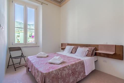 Posteľ alebo postele v izbe v ubytovaní CASA MATI Relax e stile vicino alle Cinque Terre