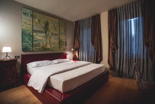 Krevet ili kreveti u jedinici u objektu Damaranto Residenza e Cucina