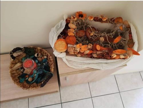 two baskets of food sitting on top of a table at DIMHA Studio in Pýrgos