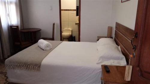 Een bed of bedden in een kamer bij Lunandina Huaraz