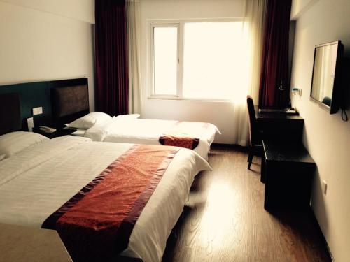 Ein Bett oder Betten in einem Zimmer der Unterkunft Super 8 Beijing Chaoyang Road Xinglong