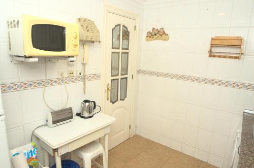 Kuchyňa alebo kuchynka v ubytovaní Habitación en el corazón del centro de Malaga