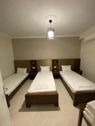 Кровать или кровати в номере Vesta House