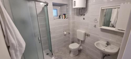 Kúpeľňa v ubytovaní Apartments Vlaho