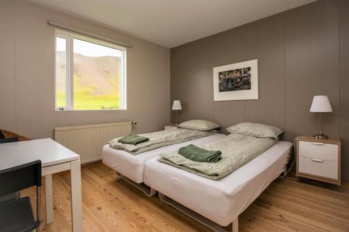 Un pat sau paturi într-o cameră la Móar guesthouse