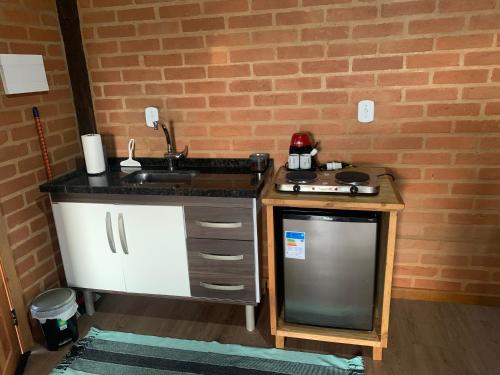 صورة لـ chalés Roma في سانتو أنطونيو دو بينهال