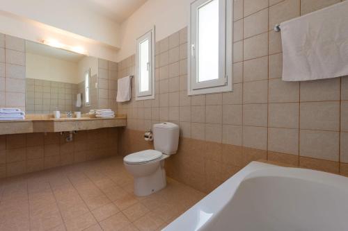 A bathroom at Villa Ermis Springs by Villa Plus