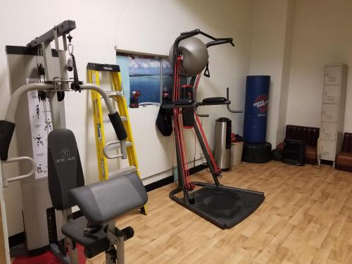 a room with a gym with two tread machines at Artist Housing - Downtown in Los Angeles