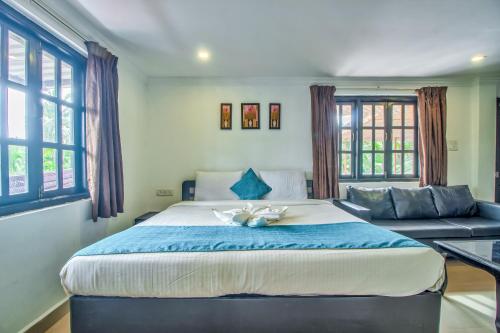 En eller flere senge i et værelse på Villa Verediana