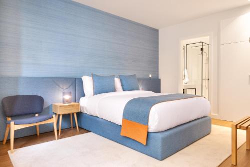 Кровать или кровати в номере Catarina Serviced Apartments