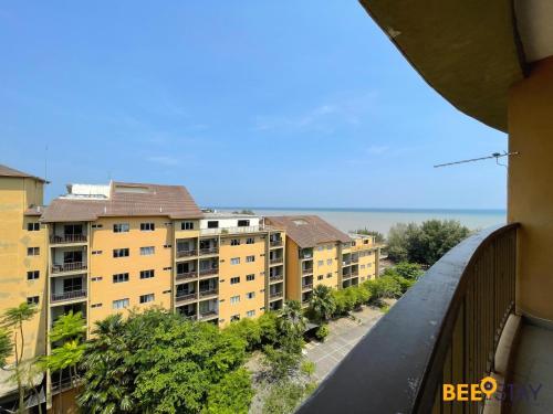 a view from a balcony of some apartment buildings at Gold Coast Morib Studio l Apartment I Penthouse in Banting