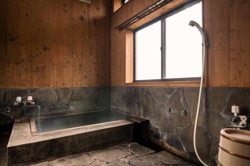 Ванна кімната в Yufuin Yukari-an Megumi no Sato