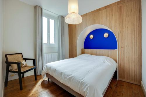 Posteľ alebo postele v izbe v ubytovaní Villa Les Hirondelles - Appartement avec Jardin Front de mer
