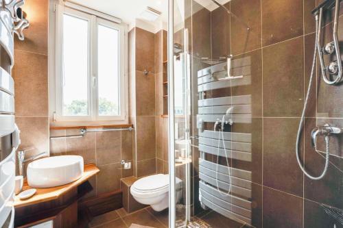 Kúpeľňa v ubytovaní Villa Les Hirondelles - Appartement avec Jardin Front de mer