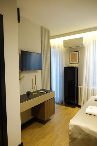 Kristall Apartments Premiumにあるテレビまたはエンターテインメントセンター