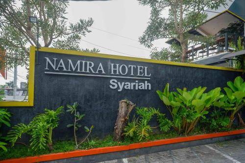 a sign for narayan hotel in a resort at RedDoorz Syariah At Namira Hotel in Yogyakarta