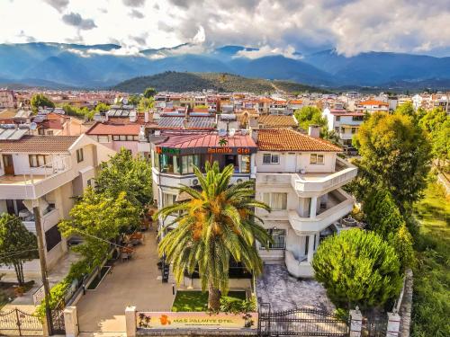 an aerial view of a city with buildings at MAS PALMİYE OTEL in Edremit