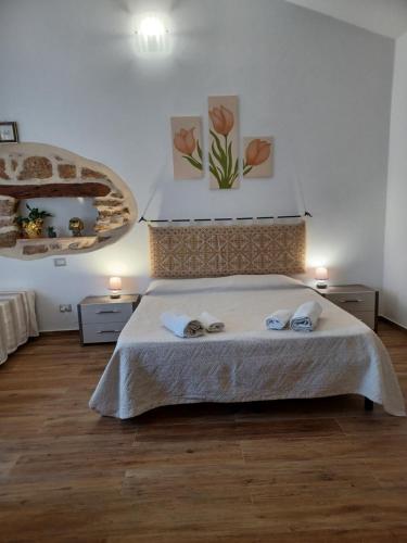 Katil atau katil-katil dalam bilik di B&B Bedda Ista