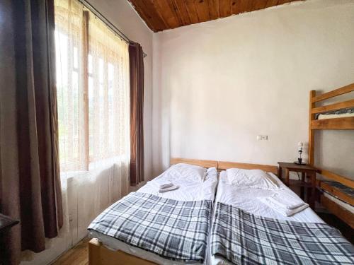 Postel nebo postele na pokoji v ubytování Guest House Svan-Ski