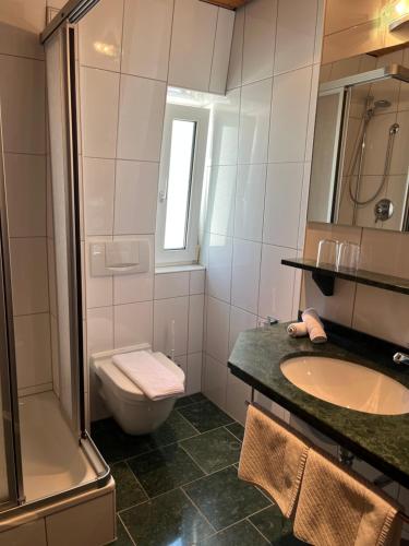 Koupelna v ubytování Hotel Schön