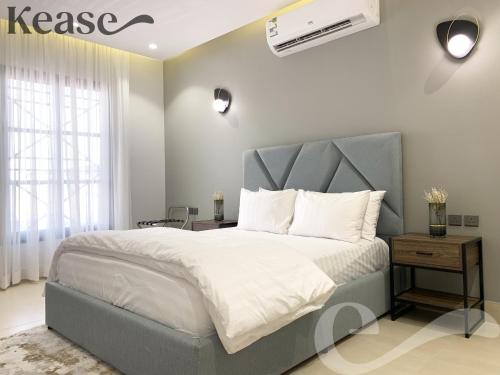 Cama o camas de una habitación en Kease Narjis B-4 Luxury Gold AG58