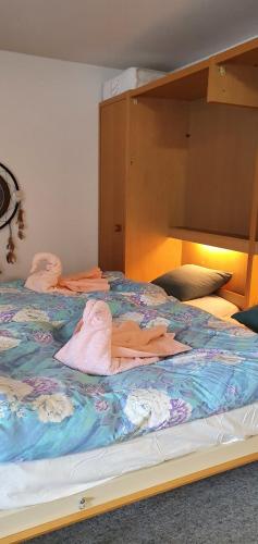 מיטה או מיטות בחדר ב-Haus Steghorn