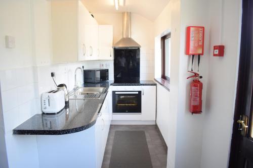 Kjøkken eller kjøkkenkrok på House Stay in Bangor North Wales