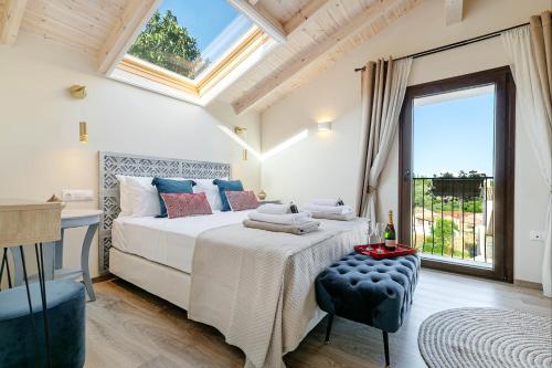 A bed or beds in a room at The Heritage Cottage in Doukades