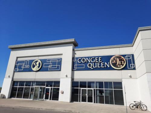 a building with a sign that reads courage oxygen at Home Stay near the Airport in Mississauga
