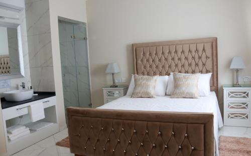 Letto o letti in una camera di 100 Boutique Living